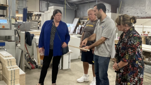 Top Shop team taking a tour of the Habitat for Humanity of Mid-Ohio Valley 